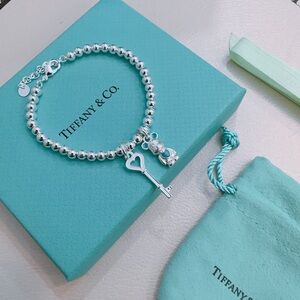 Tiffany & Co. Silver Bead Bracelet with Key and Teddy Charms in Tiffany Blue